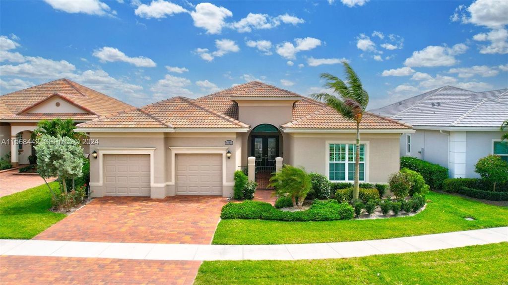 Photo of 8765 SW Flutto Way, Port Saint Lucie, FL 34987 (MLS # B26003262)