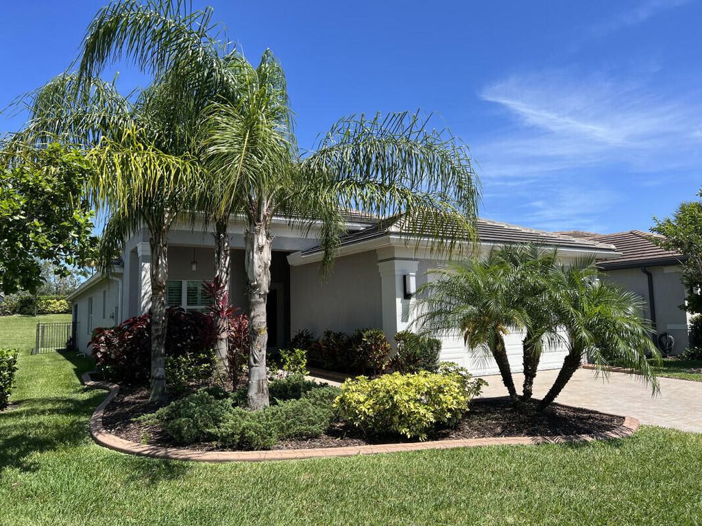 Photo of 10661 SW Sunray Street, Port Saint Lucie, FL 34987 (MLS # R10916462)