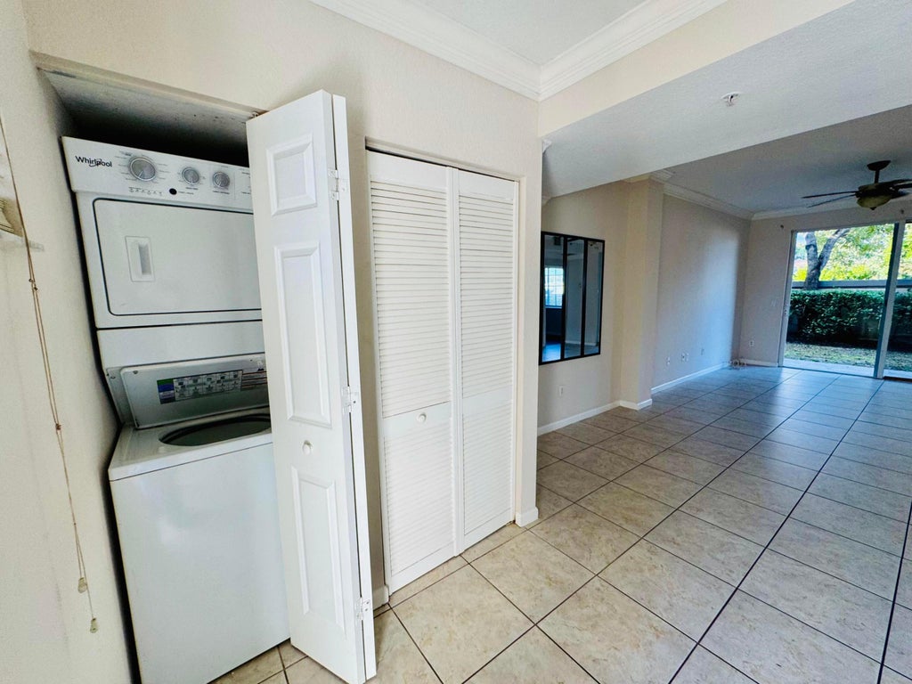 Photo of 1954 Freeport Lane #1954, Riviera Beach, FL 33404 (MLS # B26050677)