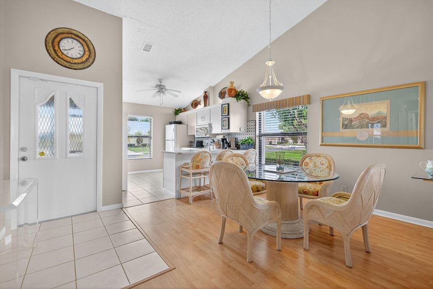 Beautiful 2/2/1 Corner Unit w/one of the best locations in the over 55+ community of Sugar Sands w/views of the community pool & club house, Large Grassy area w/no immediate neighbor to the West offering beautiful sunset views! This villa has a 2021 New Metal Roof, 2018 A/C, 2021 Hot Water Heater & Newer Appliances.  This beautiful villa has white kitchen cabinets w/granite countertops, breakfast bar, wood laminate & tile floors.  Updated bathrooms.  High Vaulted Ceilings. Decorative Arch leading to the Den or Office   Main Bedroom has walk in closet & separate walk-in shower.   Maintenance fees include Cable, Unlimited Wi-Fi, Roof maintenance, Lawn Care, Landscaping, Manager.  Close to Boat Ramp, Beautiful White Sandy Beaches, Many Golf Courses, Restaurants, Shopping and so much more!!!