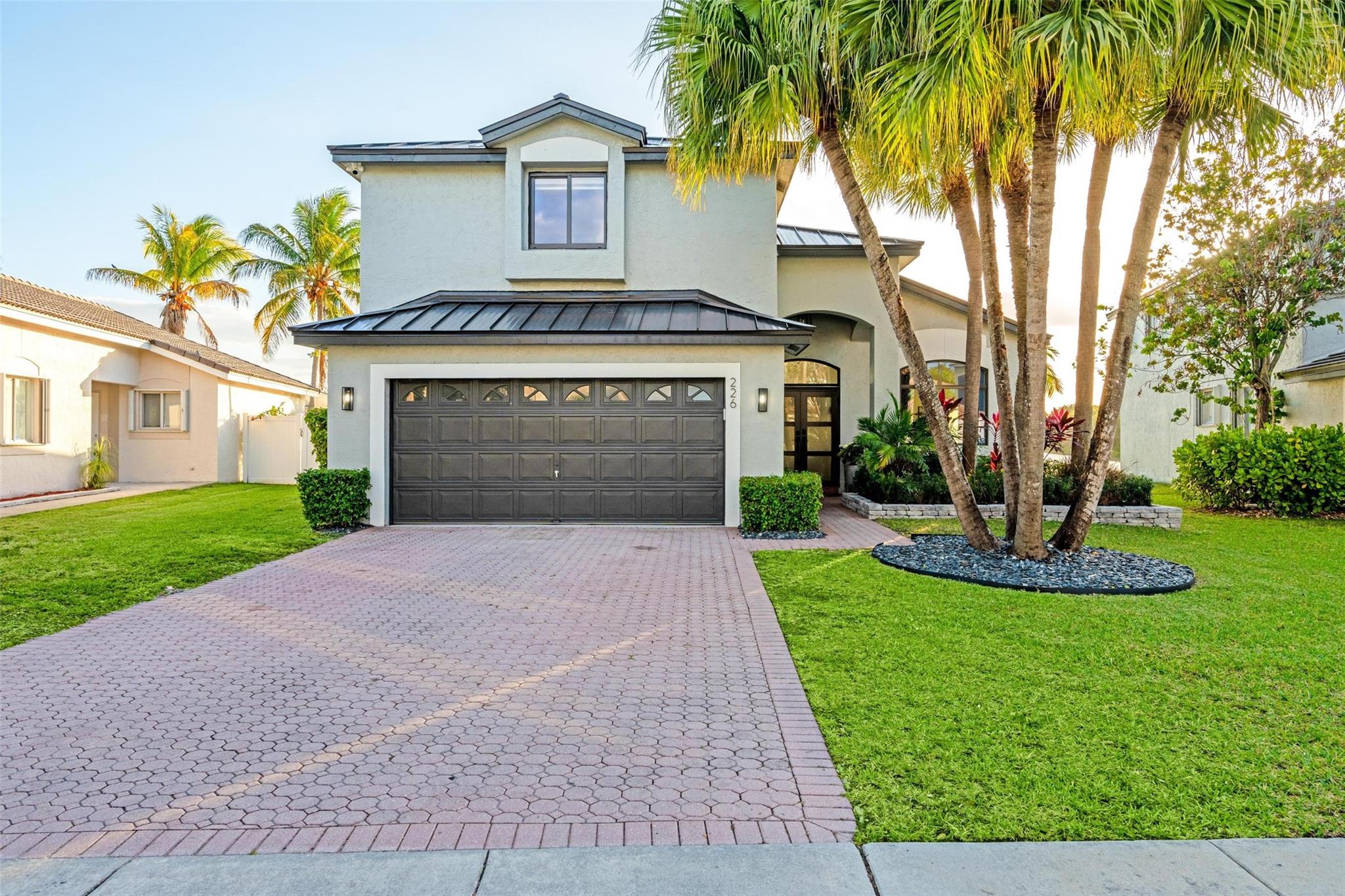 Experience Luxury Living in this Stunning 4-bedroom, 2.5 bathroom home nestled in the beautiful Community of Silver Lakes. Resort Style living with a heated saltwater pool, sun shelf, and jacuzzi, overlooking breathtaking lake views & sunsets. This property features; BRAND NEW METAL ROOF 2024, IMPACT WINDOWS & DOORS 2024, A/C 2019, Washer & Dryer 2024, Tyent Water Machine 2023 & Salt Water POOL Equipment 2022. This home's open-concept design features a modern kitchen with new LG stainless steel appliances and a island, perfect for entertaining. Tile floors flow throughout the open layout leading to the master bedroom. The owner's suite offers pool and lake views for days. HOA includes basic cable and internet. Hurry! This one won't last!