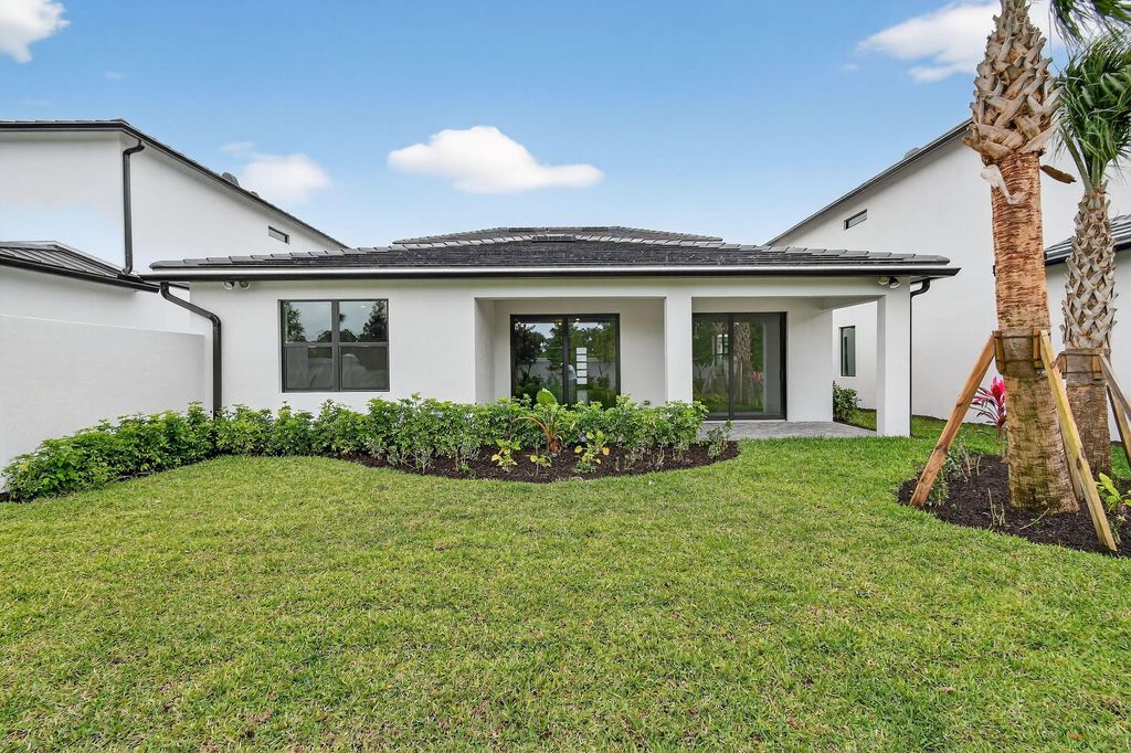 Photo of 13814 Dalrada Avenue #Coral 68, Palm Beach Gardens, FL 33418 (MLS # R11145104)