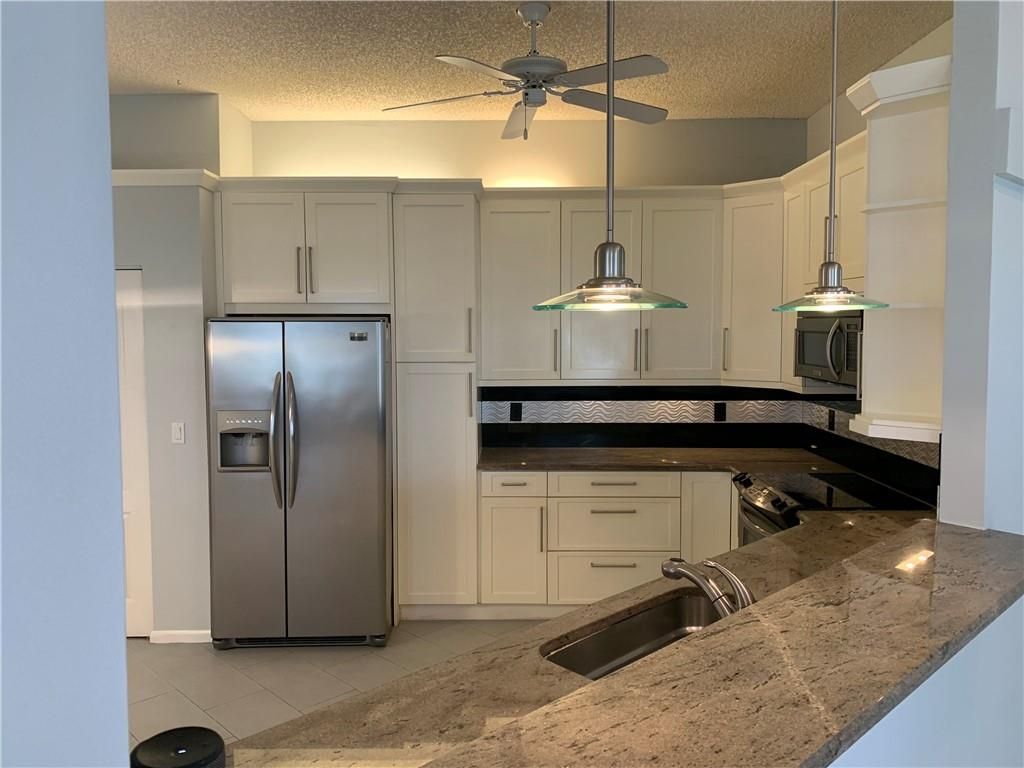 Photo of 9479 Boca Gardens Pkwy #D, Boca Raton, FL 33496 (MLS # F10312957)