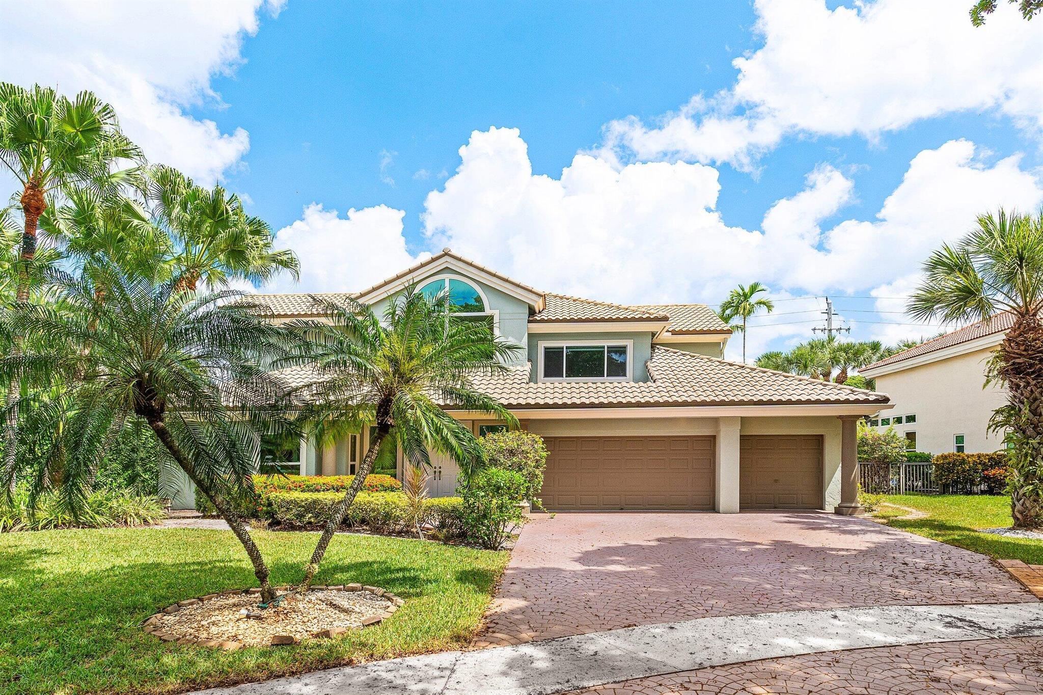 LOOK NO FURTHER!!! Situated in the highly sought after community of Central Boca Raton's Colonnade, this property has just been updated - new carpet and fresh paint throughout!! and is READY for move-in tomorrow! The property features 5 bedrooms and 4 bathrooms. 2 bedrooms are located on the main level, including the oversized primary suite that is overlooking the pool and cozy backyard. Open kitchen with cathedral ceiling, formal dining room and a large living room! Colonnade is one of Boca Raton's most desirable neighborhoods, located in an excellent school zone, minutes from Boca Town Center Mall, I-95, major parks and 2 private schools - Pine Crest and St. Andrew's. LOW HOA! The community has a 6-acre park that offers basketball courts, picnic tables, tennis courts and a playground.