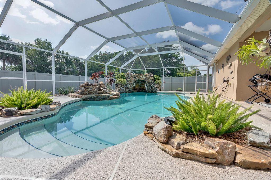 Photo of 2049 SW Americana Street, Port Saint Lucie, FL 34953 (MLS # R11110021)