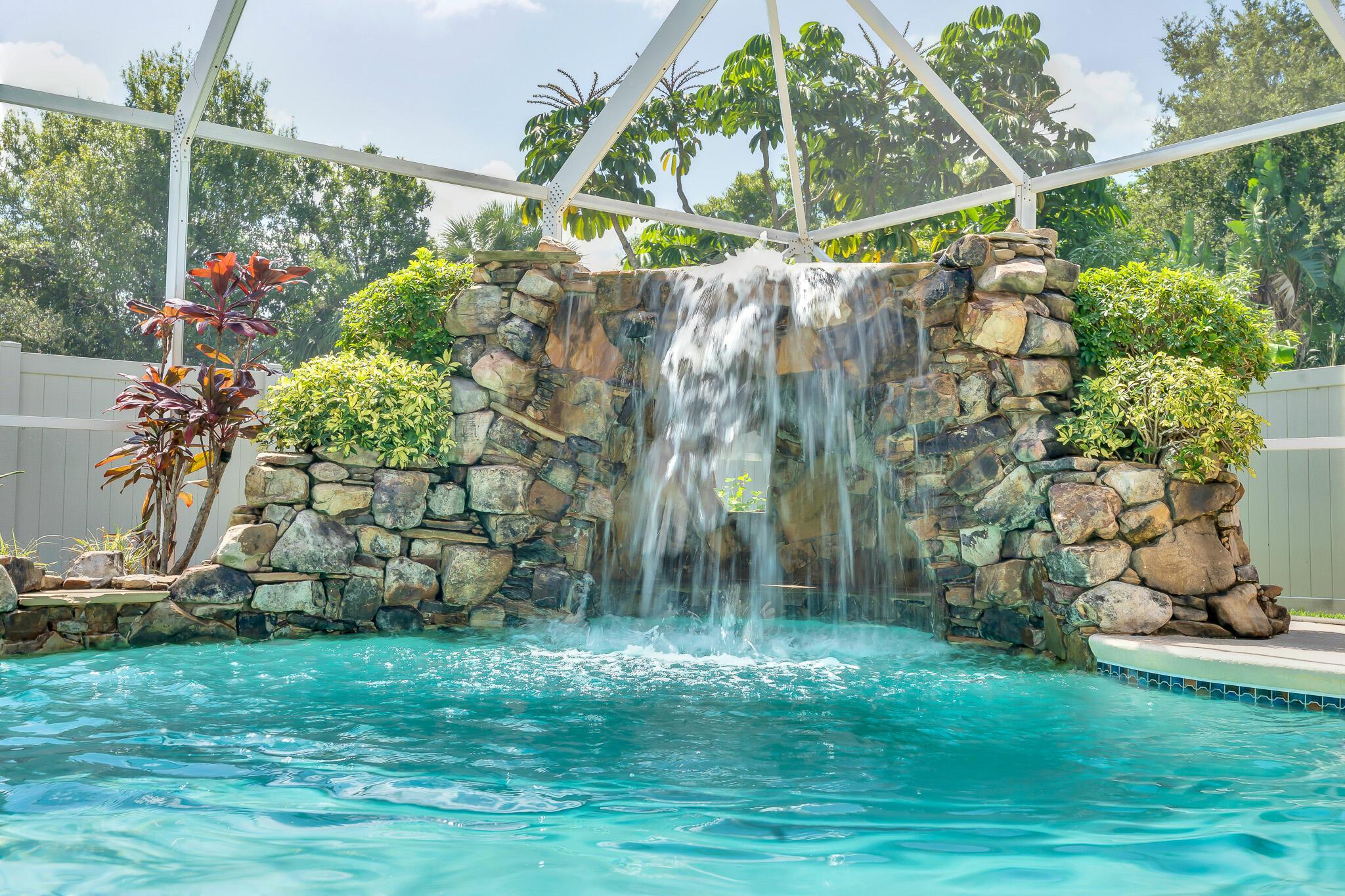 Immaculate 4 Bedroom, 2 Bathroom -Den Home. Features a STUNNING Resort Style Pool Complete with a Grotto Waterfall and Spa!- Perfect for Relaxing or Entertaining. FEATURES a BRAND NEW METAL ROOF - 2025! This Home is Centrally Located Near Tradition, Shopping, Dining, and the Highways with NO HOA! With a Spacious Split Floor Plan, This home Offers Plenty of Room for Everyone! Large Fenced in Backyard! New Blinds Throughout Home, Just Installed. Screen Enclosure Door for Garage for Extra Space.