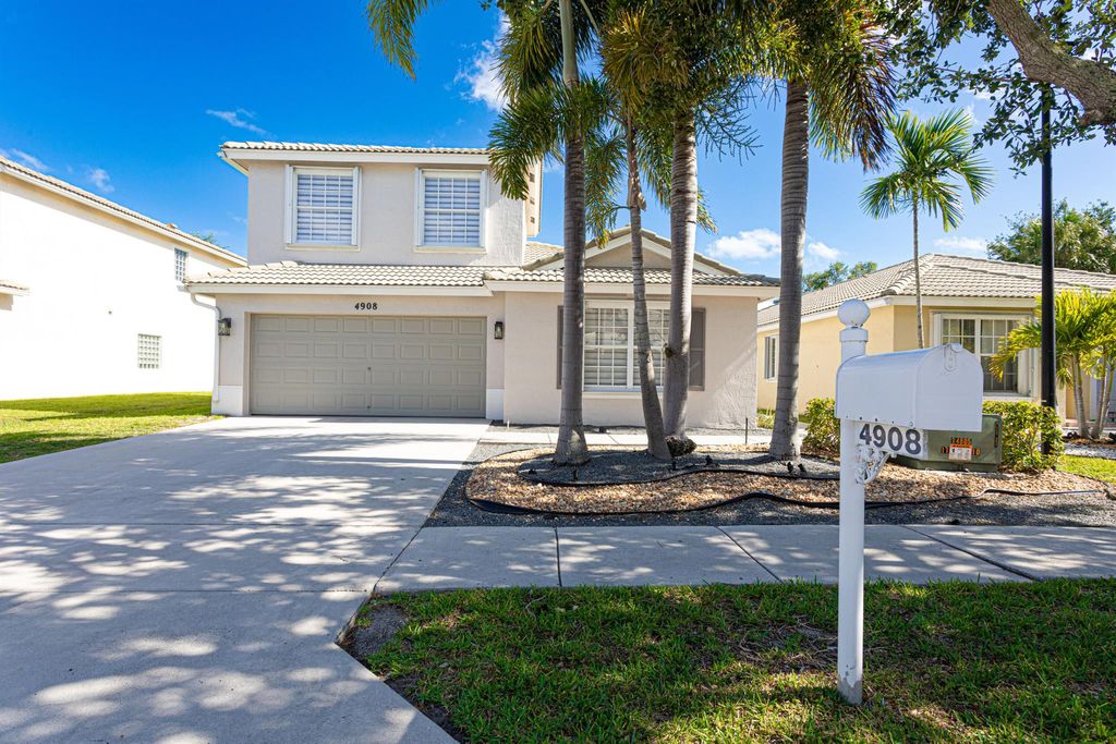 Photo of 4908 Lombard Pass Drive, Lake Worth, FL 33463 (MLS # R10991282)