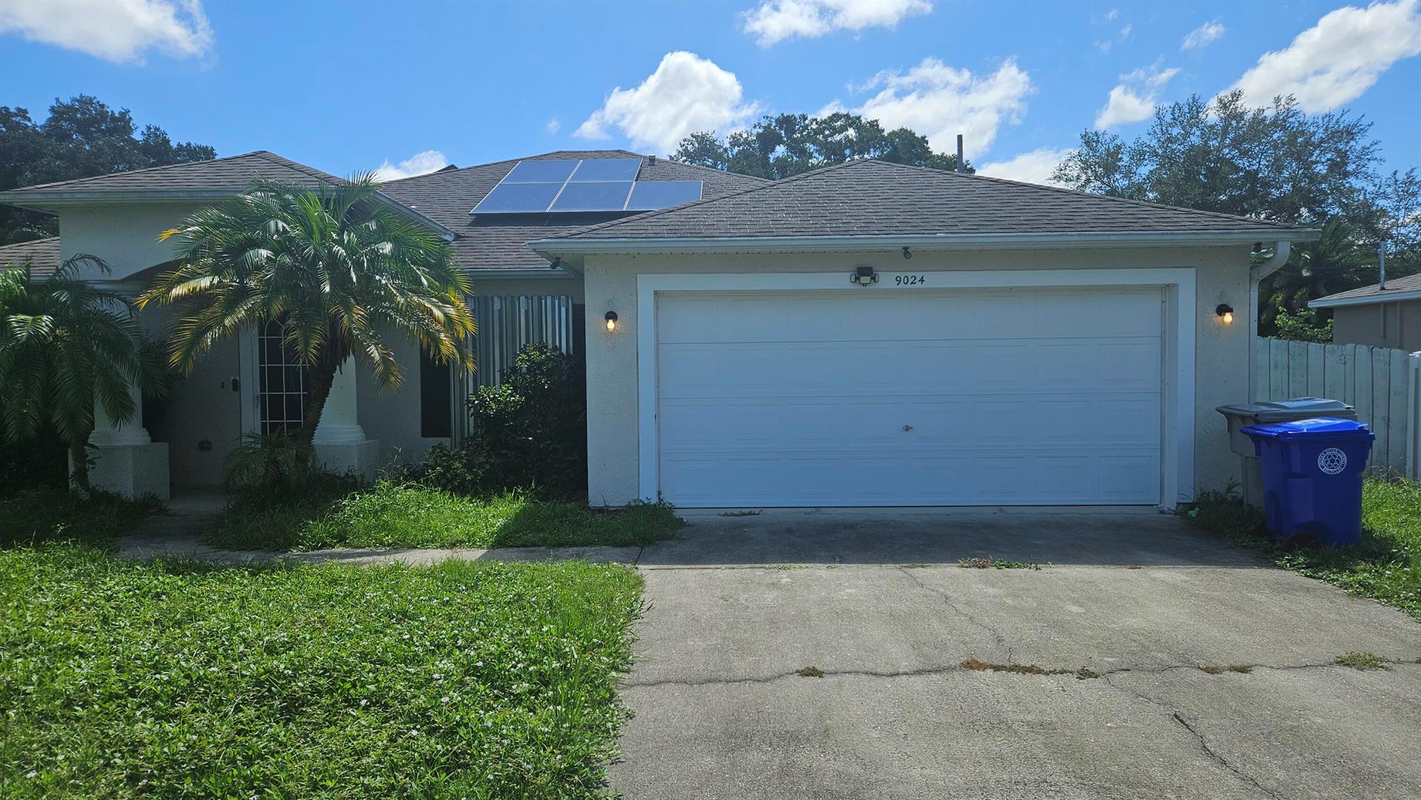 Spacious 3-bed/2-bath with a saltwater pool in Vero Lake Estates! Kitchen offers SS Appliances with w/convection oven & induction stove, quartz countertops with white tile backsplash, and under-cabinet lighting. The kitchen counter accommodates barstool seating. Home provides a formal living/dining area and split bedrooms. Large primary room with a garden tub, walk-in shower, and double sinks/vanity. Large, screened lanai with saltwater pool and fenced yard for additional privacy/pets. Air conditioning unit 2017 w/UV light for eliminating mold/mildew/mildew/viruses/bacteria and reducing odors.