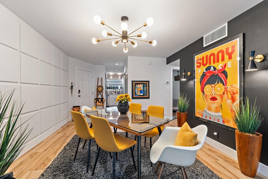 You will FALL in LOVE with this Mid-Century modern top floor unit!! No expense spared, every inch has been thoughtfully and tastefully re-designed. From the moment you enter, you are captured by the framed canvas wall and unique sleek decor. Functionally redesigned kitchen with new appliances and a modern style coffee/breakfast bar. Both bathrooms are exquisitely renovated top to bottom. All furnishings and art-work carefully handpicked to complete this sophisticated, aesthetically pleasing retreat. Enjoy the Florida winters on the private balcony over-looking beautiful greenery. Greenbrier is also steps to the beach, Pelican Lake; minutes to the finest restaurants, Golf, PBI and all that the Juno area has to offer. Escape the COLD this winter, you won't be disappointed!