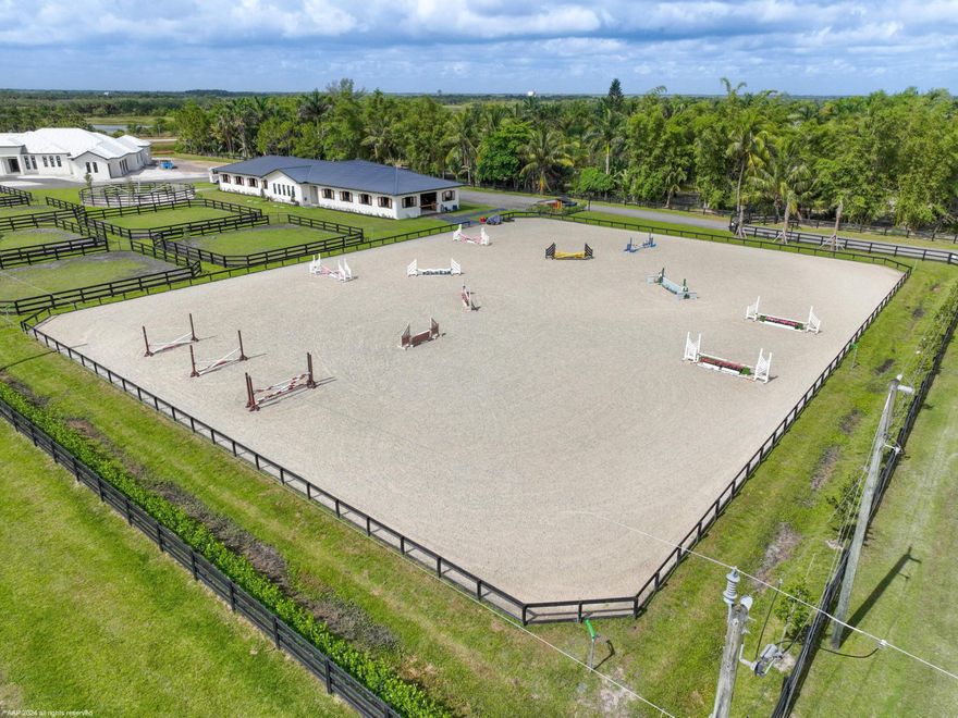 Have everything you need for a Wellington show season with this stunning, new professional horse facility (only used one season) located near the bridge to the show grounds! This 5 acre property has up to 14 stalls available, 8 paddocks, 6-horse MK Walker, and a new 150' x 200' Drew Discount arena. The barn features matted aisles and stalls, two feed rooms, two tack rooms, one laundry with 4 machines, lounge with kitchenette, full bathroom and 2 50 amp full service RV hookups with septic (to rent at additional fee). One of the closest farms in RR to the land bridge into Wellington- hack to the show in roughly 20 minutes or golf cart in 5! This property is also directly adjacent to the Wellington Environmental Preserve that has a maintained and scenic 3.3 mile riding trail. List Price of $10,000 is the seasonal rate per stall and includes a 4 month term, additional time available for an additional expense. Stalls are also available off-season or annually, 6 stall minimum lease required.