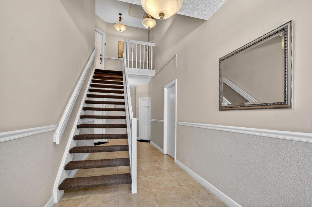 Photo of 5801 Coach House Circle #H, Boca Raton, FL 33486 (MLS # F10516789)