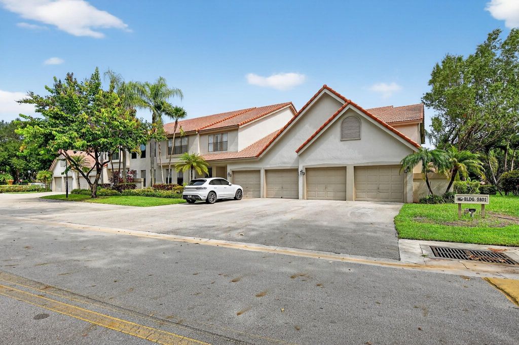 Photo of 5801 Coach House Cir #H, Boca Raton, FL 33486 (MLS # F10516789)