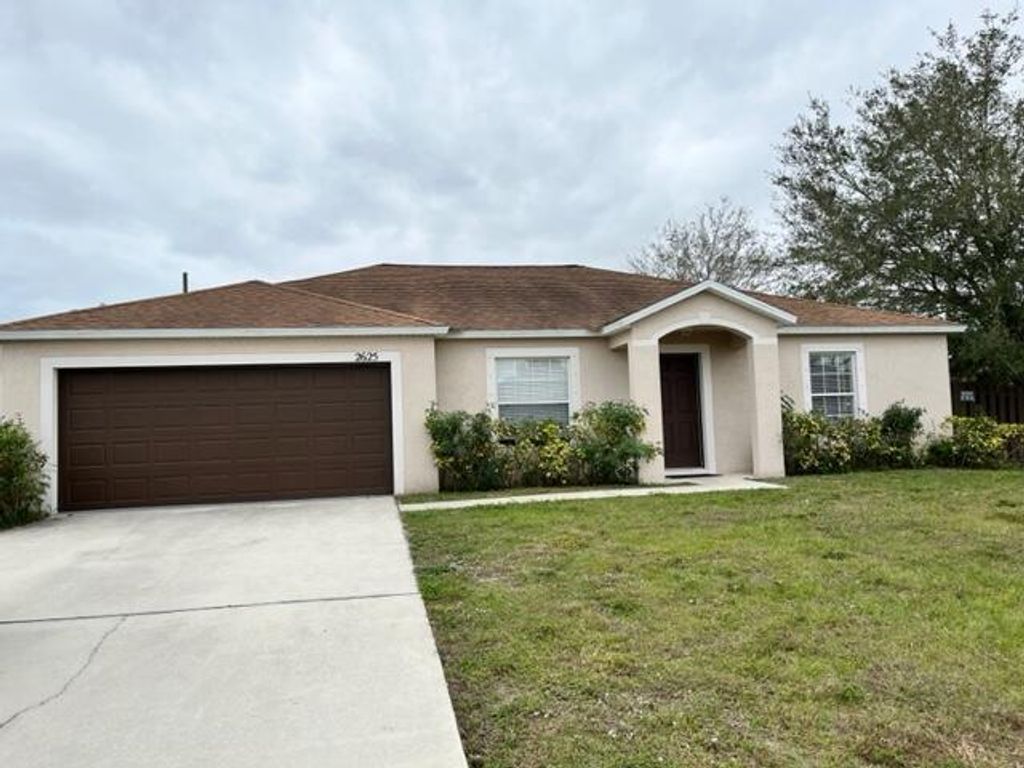 Photo of 2625 SW Acco Road, Port Saint Lucie, FL 34953 (MLS # R11060463)