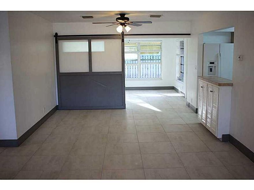 Great location close to 95, transportation, shopping, airport, and the beach.  Property is in the heart of Hollywood.  Home has been remodeled - new floors, appliances, vanities, paint, blinds, etc.  3rd bedroom's sliding door can easily be left open to be used as a Florida room.  Fenced in yard.  Pets are OK depending on size and owner's approval, however owner requires a non-refundable pet-deposit.