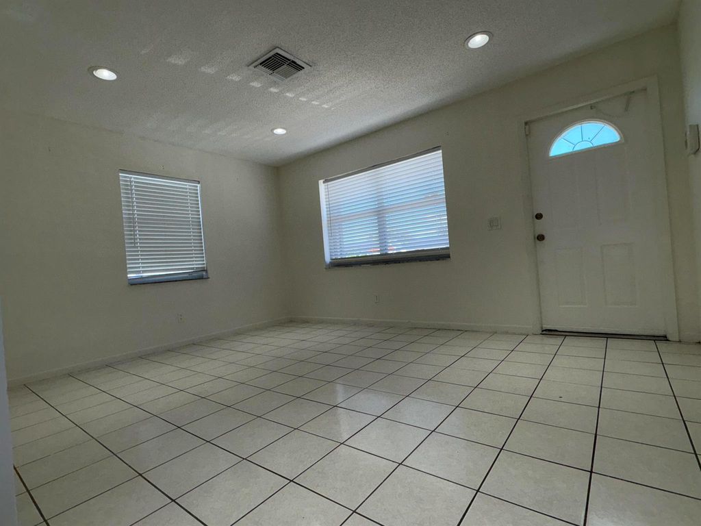 Photo of 4609 Pruden Blvd, Lake Worth, FL 33463 (MLS # R11133330)