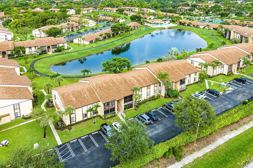 Photo of 826 Sky Pine Way #D1, Greenacres, FL 33415 (MLS # B26037694)