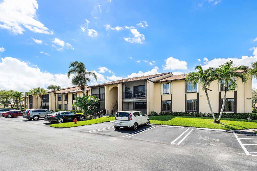 Photo of 826 Sky Pine Way #D1, Greenacres, FL 33415 (MLS # B26037694)