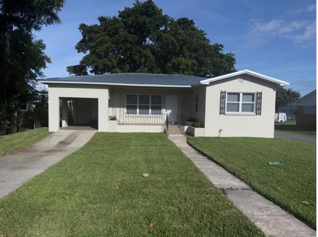 Photo of 148 S Flame Avenue, Pahokee, FL 33476 (MLS # R11129441)