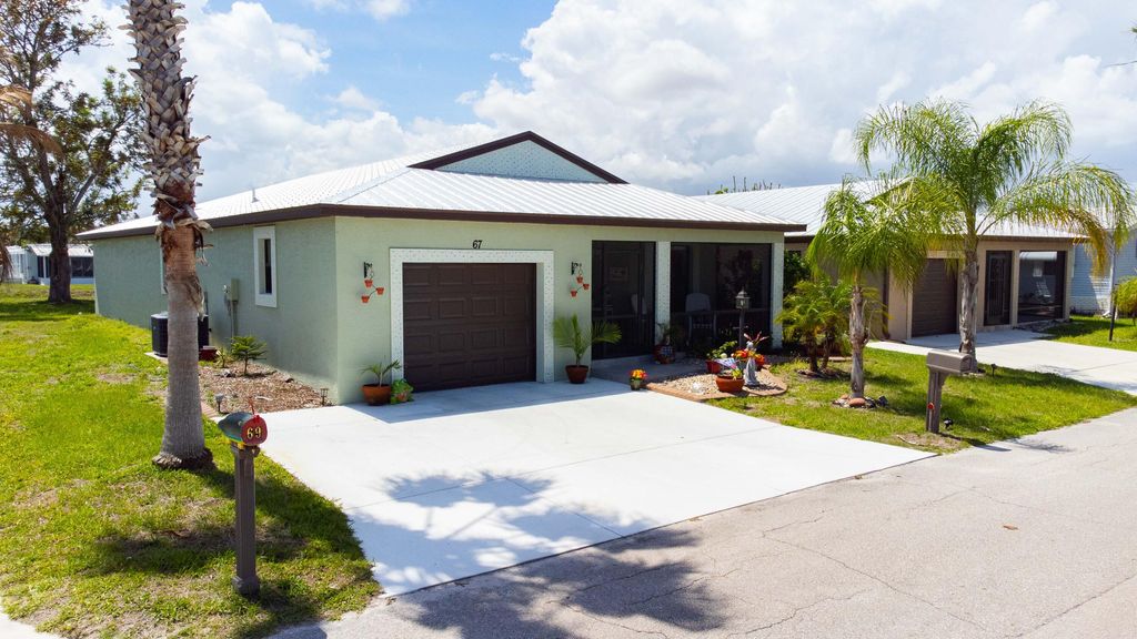 Photo of 67 El Camino Real Real, Port Saint Lucie, FL 34952 (MLS # B26012557)