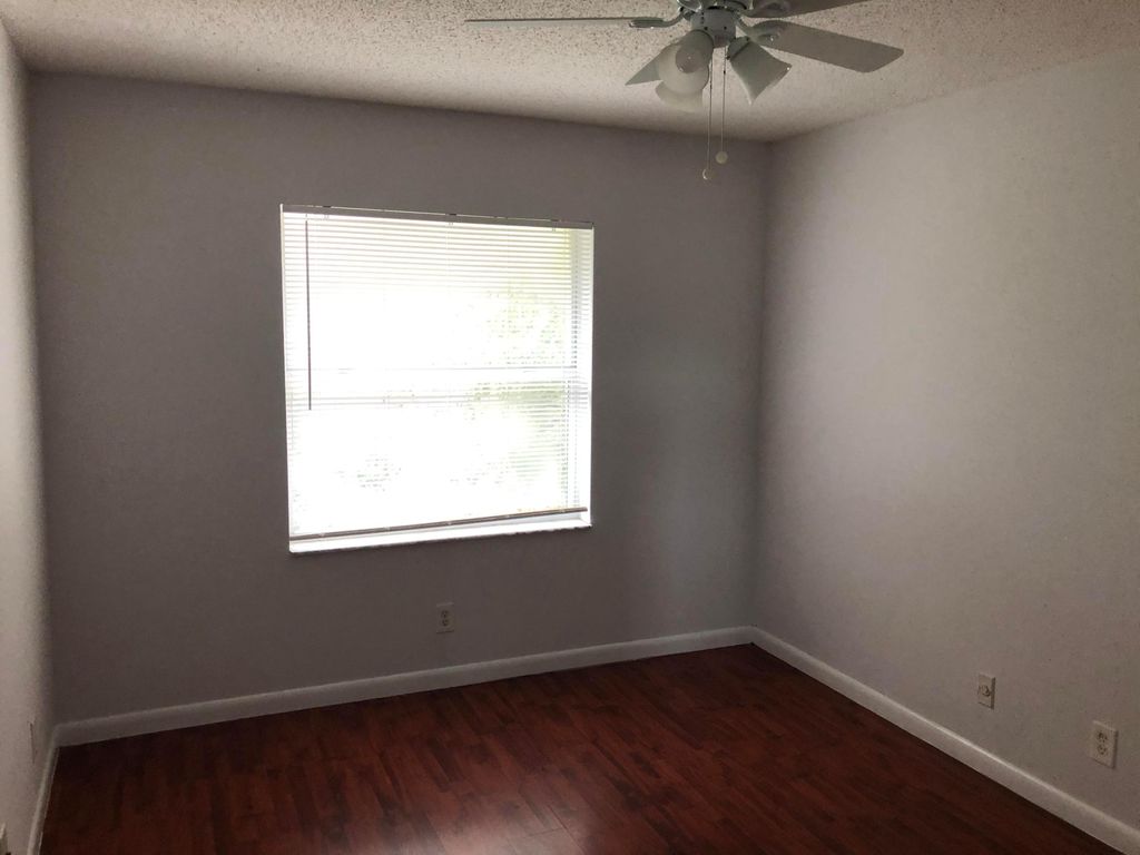 Photo of 1431 Cypress Way W, Palm Springs, FL 33406 (MLS # B26020767)