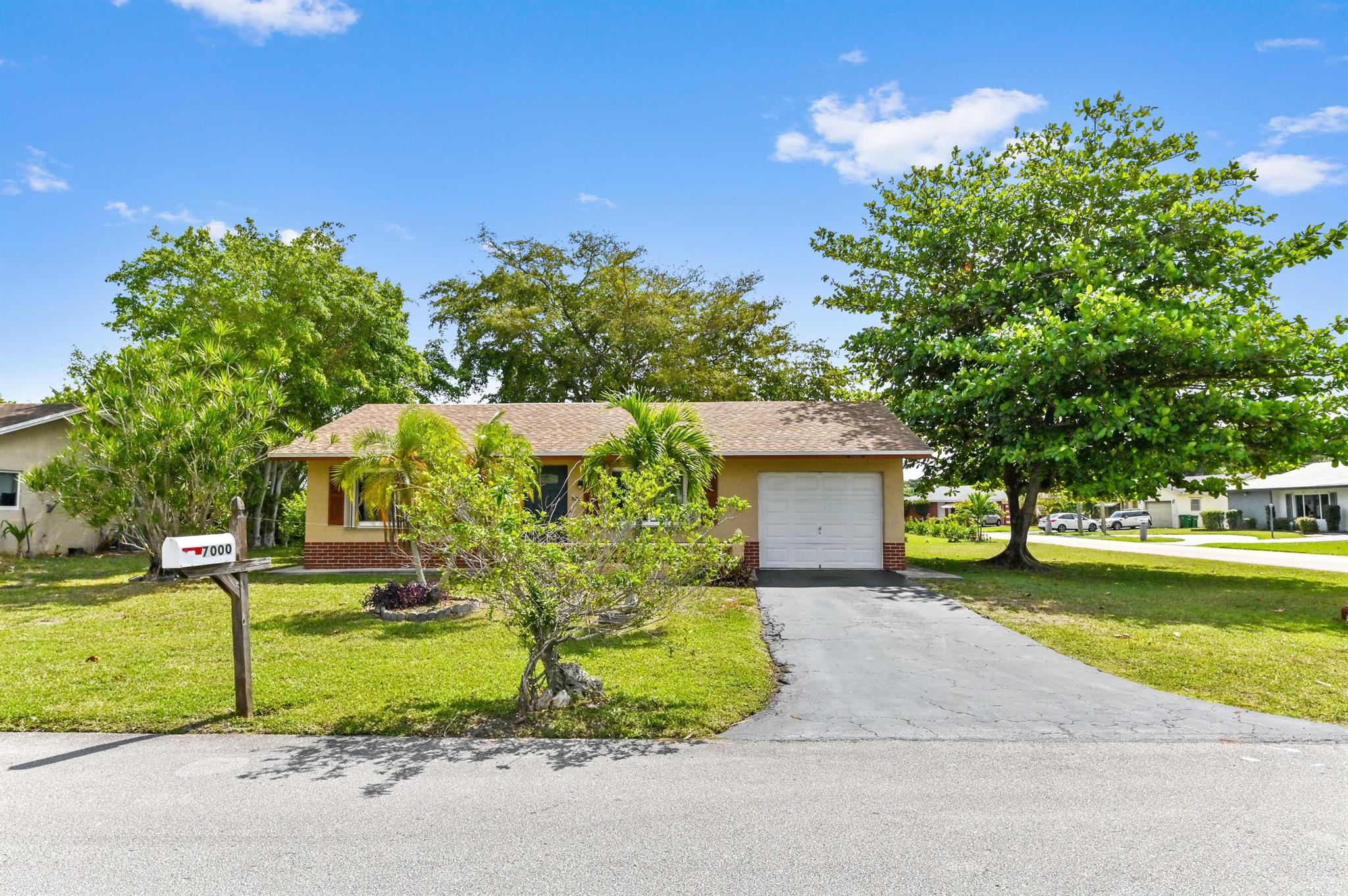 Seller offering $5,000 credit to buyer at closing !! Welcome to this beautiful 2-bedroom, 1-bath large corner lot gem tucked away in the peaceful 55+ community of Westwood. From the moment you arrive, you'll appreciate the inviting curb appeal, spacious one-car garage, and lush surroundings. Inside, the home boasts a bright and airy family room filled with natural light, while the kitchen features white cabinetry, gleaming granite countertops, and stainless steel appliances--perfect for preparing your favorite meals with ease.