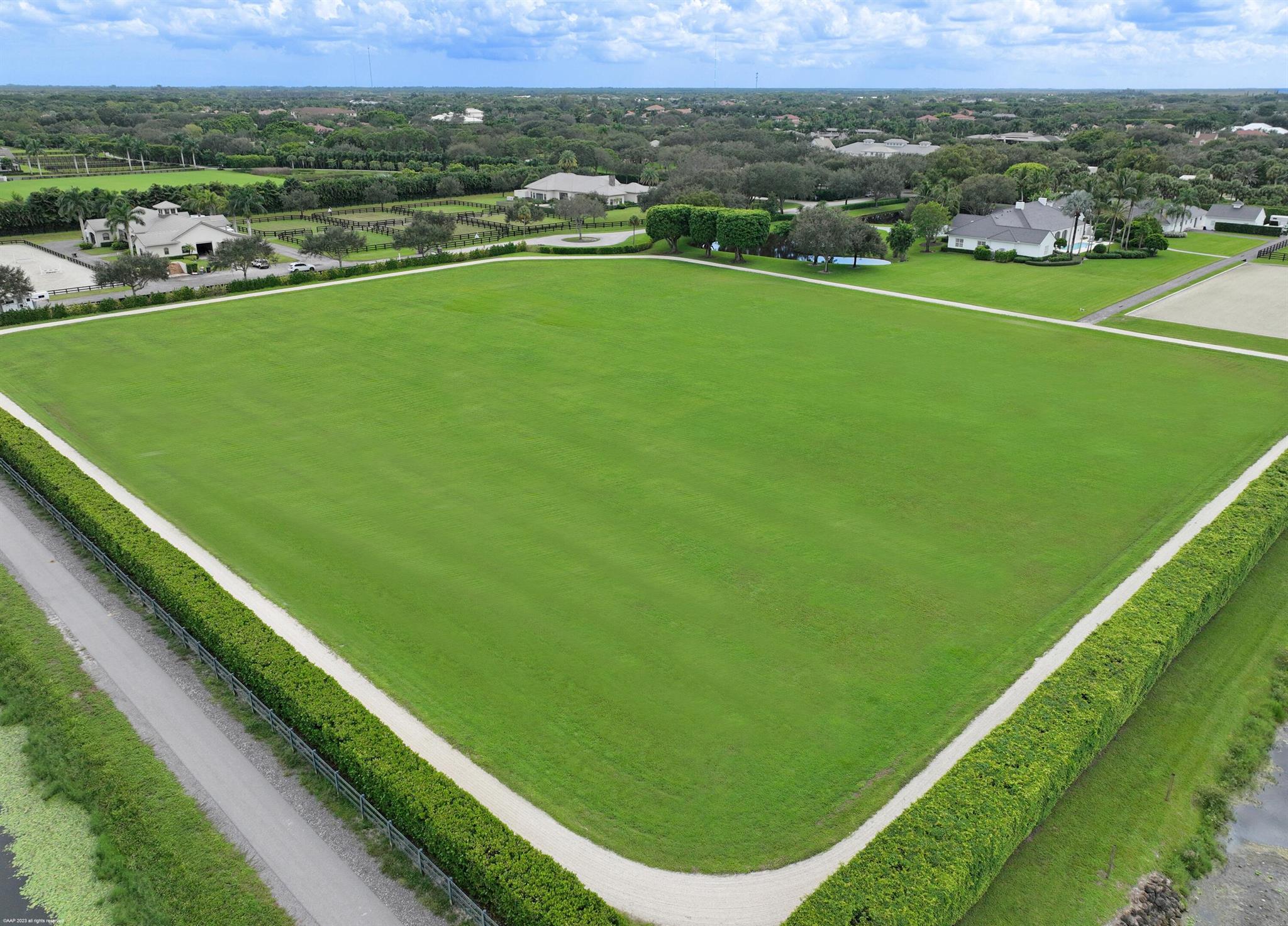 Improved 5.13 acres in the front of Palm Beach Point with easy access to the front gate, and direct bridle path access straight down Pierson Road to the WEF Showgrounds! Situated on a cul de sac, this lot has been filled, hedged, irrigated and boasts a perimeter exercise track with Wordly-Martin footing. One of the last vacant lot opportunities within close proximity to the showgrounds. Don't miss out!