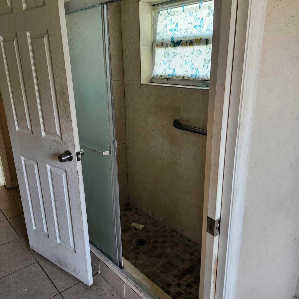 Photo of 1307 NW 15th Place, Fort Lauderdale, FL 33311 (MLS # B26029338)