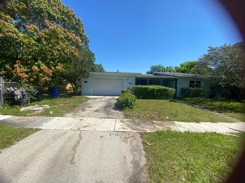 Photo of 1307 NW 15th Place, Fort Lauderdale, FL 33311 (MLS # B26029338)