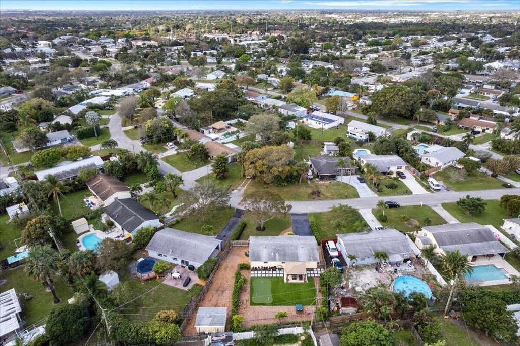 Photo of 409 Reo Drive, Jupiter, FL 33458 (MLS # R10958244)