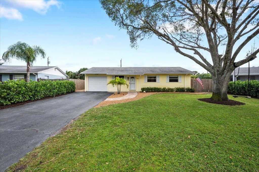 Photo of 409 Reo Drive, Jupiter, FL 33458 (MLS # R10958244)