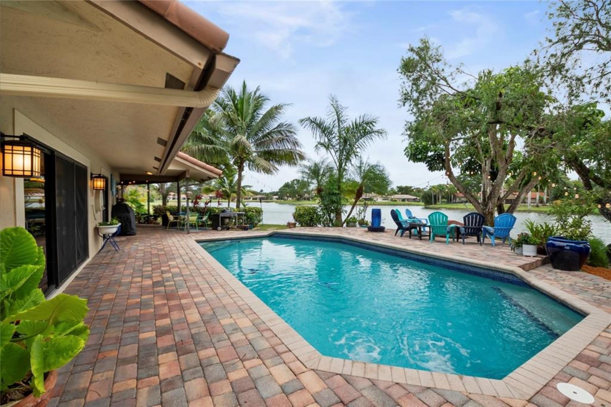 Exquisite 2-story lakefront pool home nestled on a serene cul-de-sac lot with stunning water and sunset views in higly sought after Glen Oaks! This rare find boasts marble floors, double-sided stone fireplace, high ceilings, custom kitchen, upgraded baths, impact windows and doors, over-sized washer & dryer and 2-car garage. Enormous master suite encompassing the entire second floor features a private terrace overlooking the lake. Additional rooms include great kitchen/family room and formal living/dining. Spectacular fenced, tropical backyard with inground pool and lush foliage is fun and entertaining guests. Vivint home security system w/ electric keypad-coded front door lock, ring camera/doorbell and ring camera on driveway. Truly a gem near major highways, schools​​‌​​​​‌​‌​​​‌‌​​​‌‌‌​​‌​​‌‌​​​​ ++