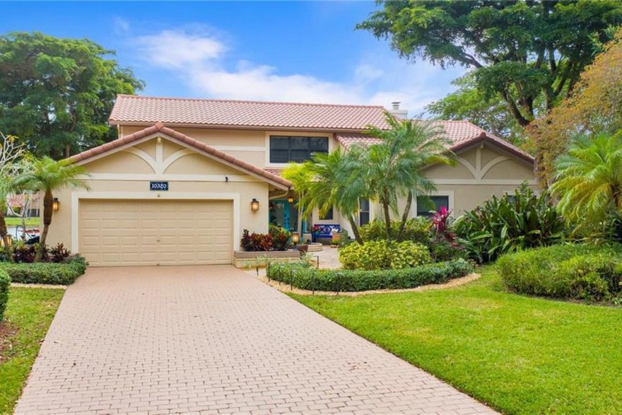 Exquisite 2-story lakefront pool home nestled on a serene cul-de-sac lot with stunning water and sunset views in highly sought-after Glen Oaks! This rare find boasts over 3,600 sqft under air, plenty of room to add a 5th BR if needed, marble floors, double-sided stone fireplace, high ceilings, custom kitchen, upgraded baths, impact windows & doors, washer & dryer & 2-car garage. Enormous primary ste encompassing the entire 2nd flr feat a private terrace overlooking the lake. Additional rooms include an open kitchen/family room and formal living/dining. Spectacular FENCED, tropical backyard with in-ground pool and lush foliage is serene & perfect for entertaining. Vivint home security system w/ electric keypad-coded front door lock & camera. Truly a gem near major highways, schools, etc​​‌​​​​‌​‌​​​‌‌​​​‌‌‌​​‌​​‌‌​​​​ ++