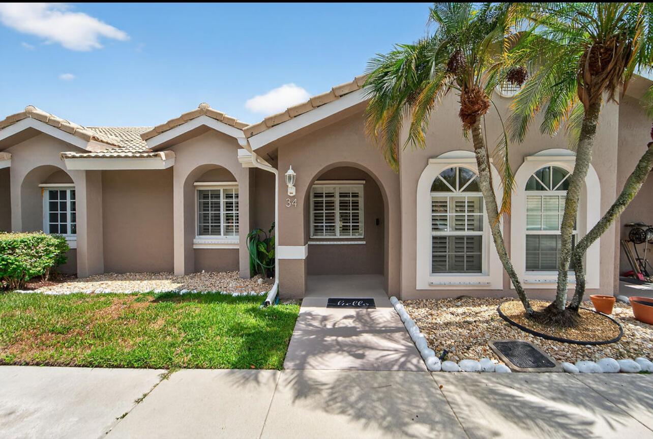 Discover this beautiful 2/ 2 villa in the peaceful Holiday Springs Village community. This one-story villa has everything you are looking for, all-ages and pets welcome. Villa has charming curb appeal and offers fantastic value with a low HOA. Step inside and enjoy an open, spacious layout with a newer kitchen and stylish tile flooring throughout. The cozy patio provides a serene spot to relax while taking in the tranquil golf course and lake views. The low HOA fee covers pool, clubhouse, party room and garbage pick up.. Located in the heart of Margate- close to major highways, schools, and shopping. This is an incredible opportunity for a beautiful villa for an exceptional price point.