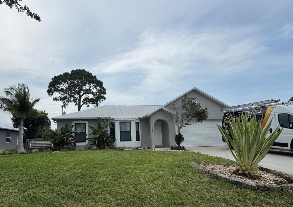 Photo of 2141 SW Janette Avenue, Port Saint Lucie, FL 34953 (MLS # F10505065)