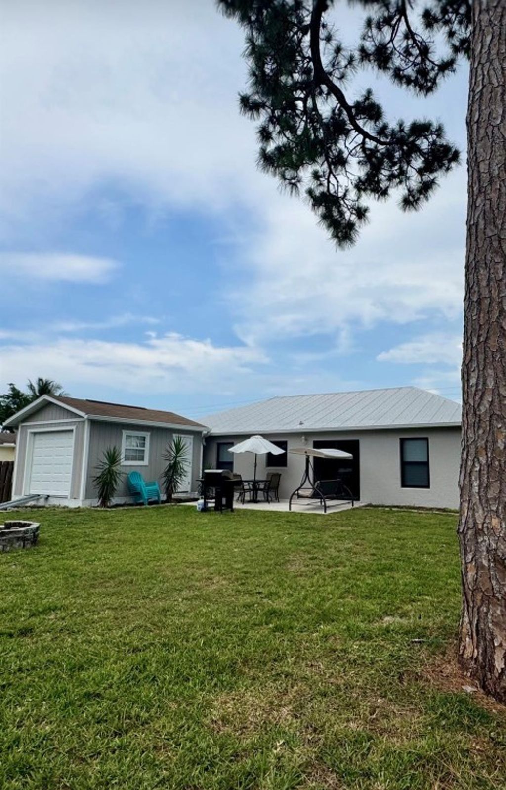 Photo of 2141 SW Janette Avenue, Port Saint Lucie, FL 34953 (MLS # F10505065)