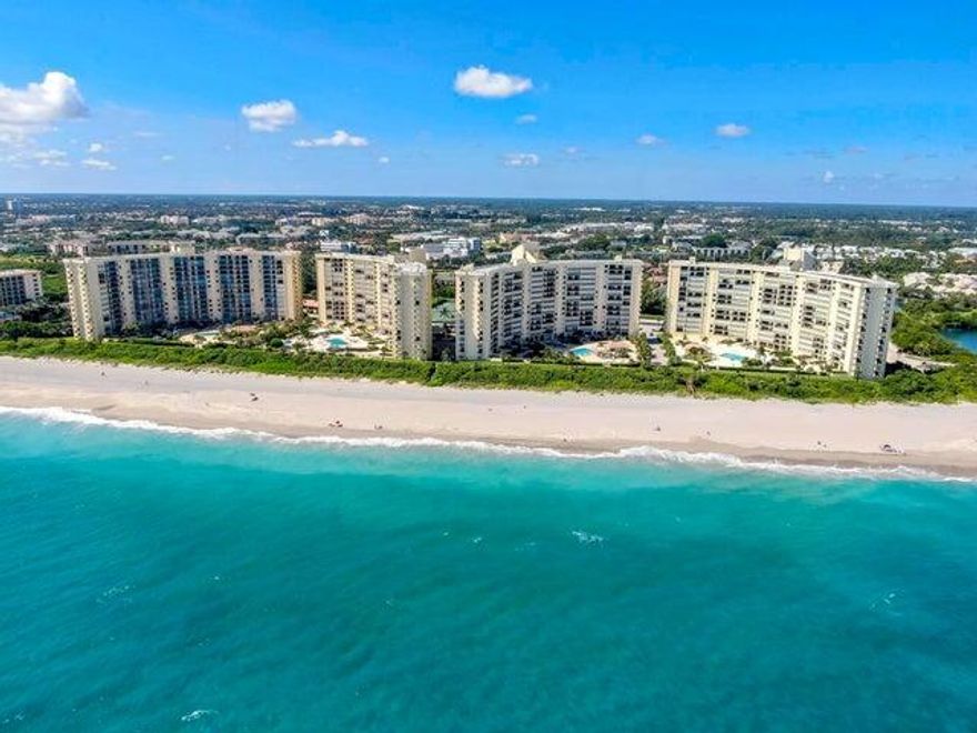 Welcome to Unimpeded Beach Access! That's right! Ocean Trail is the ONLY Jupiter condo community with NO street between it and the beach. This cute cozy 2 bed 2 bath beachfront condo comes fully furnished. With a balcony almost 30 ft long you can enjoy the early morning breezes and your morning cup of coffee during the sunrise. The enormous pool deck is fit for a 4 start resort guest. And if you want a wonderful resort for your guests you've got the Jupiter Beach Resort next door with private access from Ocean Trail. With eastern and western sunlight flowing through the condo along with the ocean breezes, you've got the beach in the palm of your hands. Plus, you're in the immediate proximity of the best new restaurants and classic mainstays that Jupiter