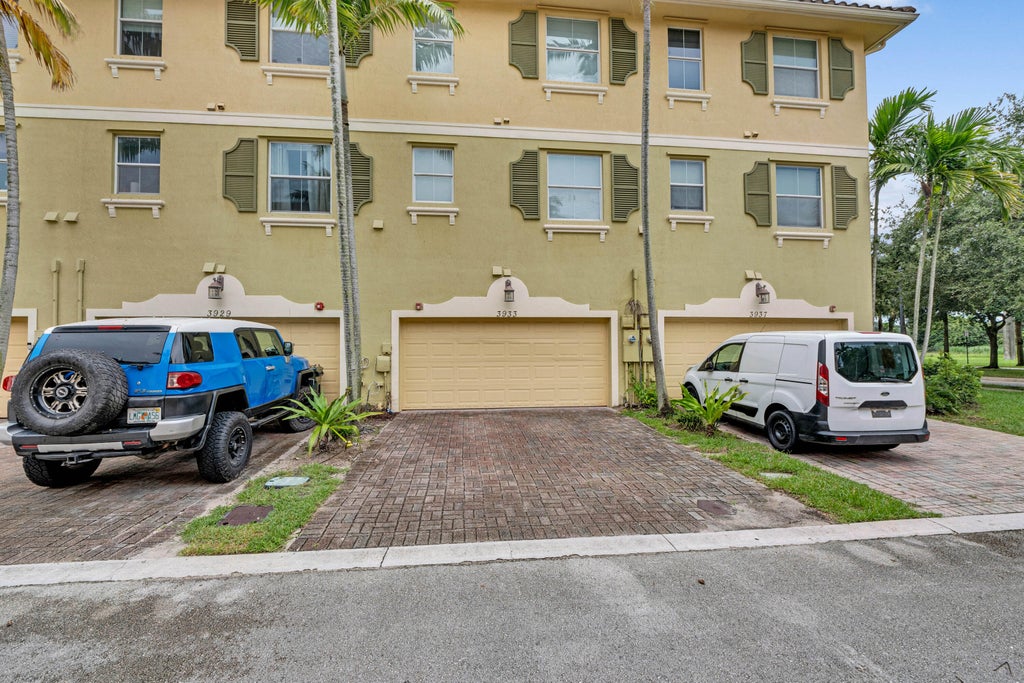 Photo of 3933 MONARCH Lane, Coconut Creek, FL 33073 (MLS # B26074686)