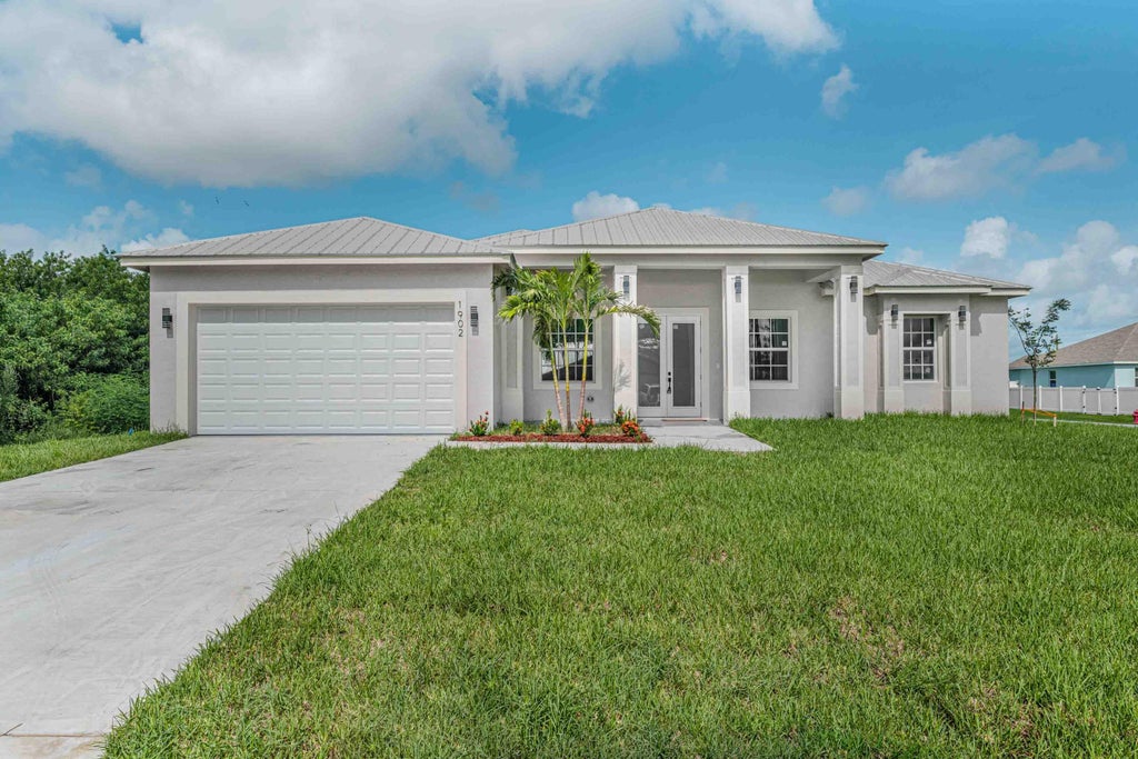 Photo of 2319 SW Salmon Road, Port Saint Lucie, FL 34953 (MLS # R10989666)