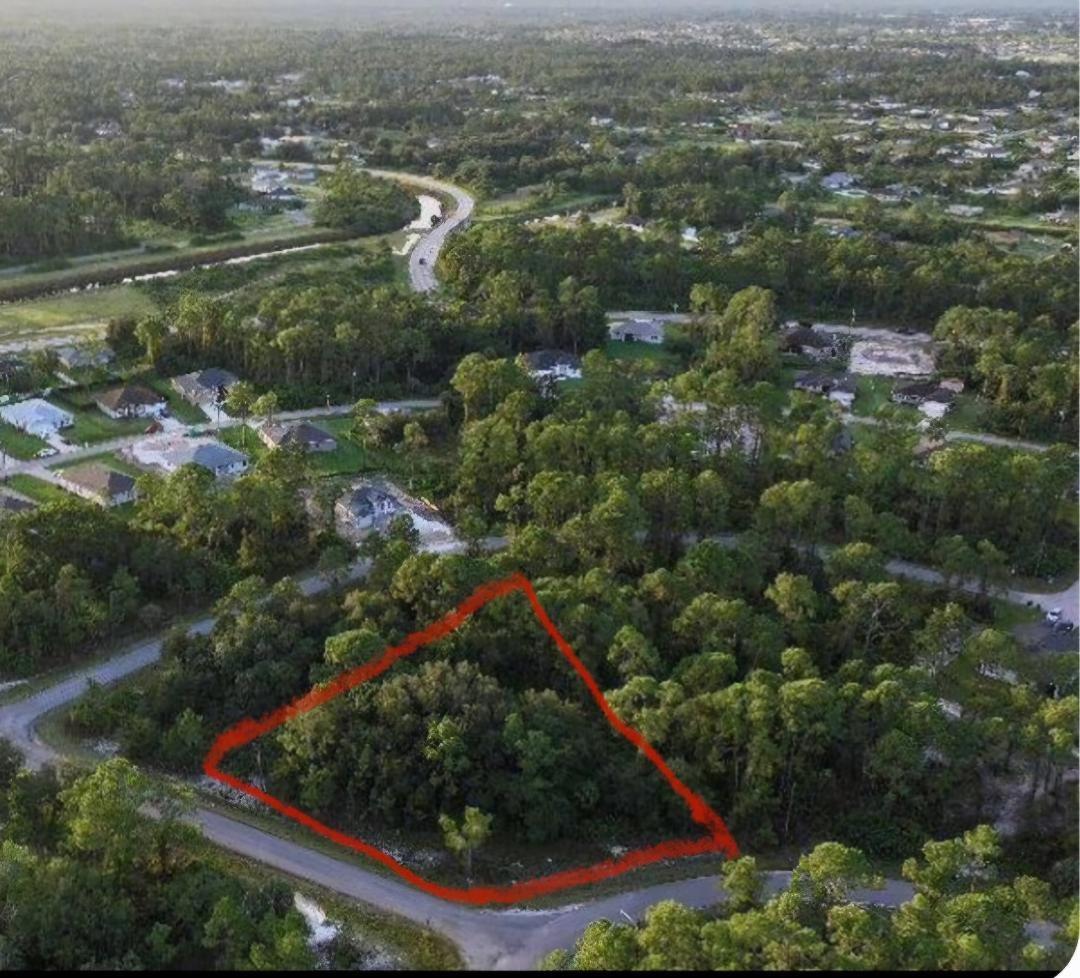 This spacious vacant lot offers an incredible opportunity for buyers to design and build the home of their dreams. Situated on a .39-acre corner lot, this property provides ample space for various construction options. The parcel has electricity access available; a well and septic system are required. One of the standout features of this property is its freedom from HOA fees. Located in the thriving community of Lehigh Acres, the area is experiencing steady growth with new homes and developments, reflecting its increasing popularity and investment potential. Conveniently positioned between two of Florida’s most sought-after beach destinations—Naples and Fort Myers, this location has it all. LET'S TALK!!!