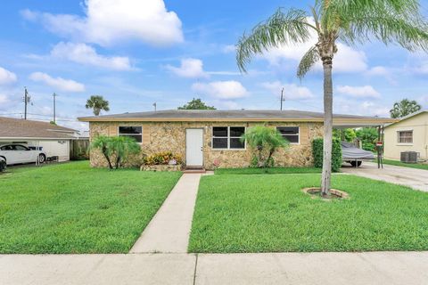 Photo of 621 W 35th Street, Riviera Beach, FL 33404 (MLS # R11115161)