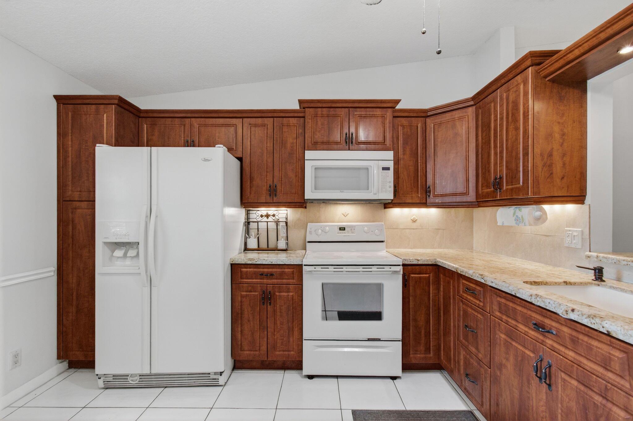 WHISPER WALK--SUPER ACTIVE ADULT COMMUNITY. LOCATION...LOCATION...LOCATION! Close to the Gate, the Parklane Clubhouse, and Places of Worship in the desirable Parklane section. FULLY FURNISHED: 2025-2026 SEASONAL RENTAL--$3,500. AN ANNUAL RENTAL--$2,750. Spend the winter months basking in the sunshine in this lovely & comfortable condo in Whisper Walk, Boca Raton. Fully furnished, 2 bedrooms, 2 bathrooms. Enveloped in timeless design and modern comforts, this enchanting residence at 18541 Cherborg Drive D, Boca Raton, FL, invites you into a world of tranquility, endowed with an active adult community lifestyle.