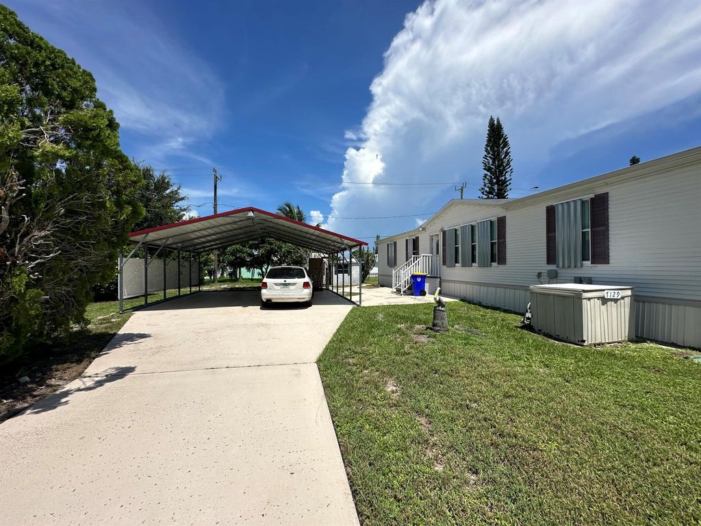 Photo of 7129 SE Ridgeway Terrace, Hobe Sound, FL 33455 (MLS # R11016586)