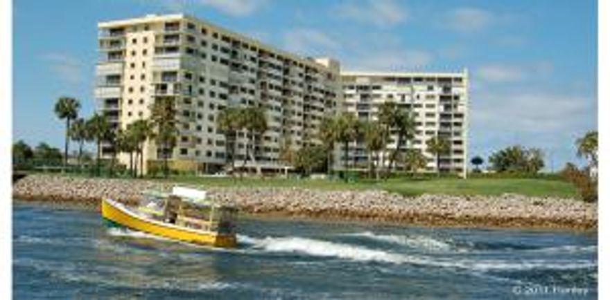 2/2 WHAT A VIEW!! Waterfront Gated Community! RARELY offered for sale!!! Upper 10th floor, EAST WING! Middle condo, best view! Only 3 condos per wing, 2 full time neighbors. On the cat walk WITH LARGE KITCHEN WINDOW  to allow for cross breezes!!  This Condo features 2 MASTER SUITES, fabulous split floor plan. Completely renovated! Kitchen features LG Stainless Appliances with 5 year warranty! Custom  cabinetry. LARGE Granite BREAKFAST BAR! Both Master Baths Updated! Bamboo flooring/tile throughout. FULL Ea