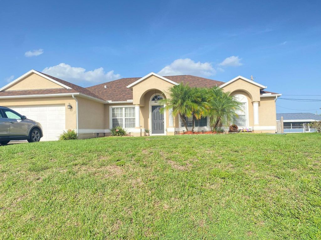 Photo of 4617 SW Tacoma Street, Port Saint Lucie, FL 34953 (MLS # R11098832)