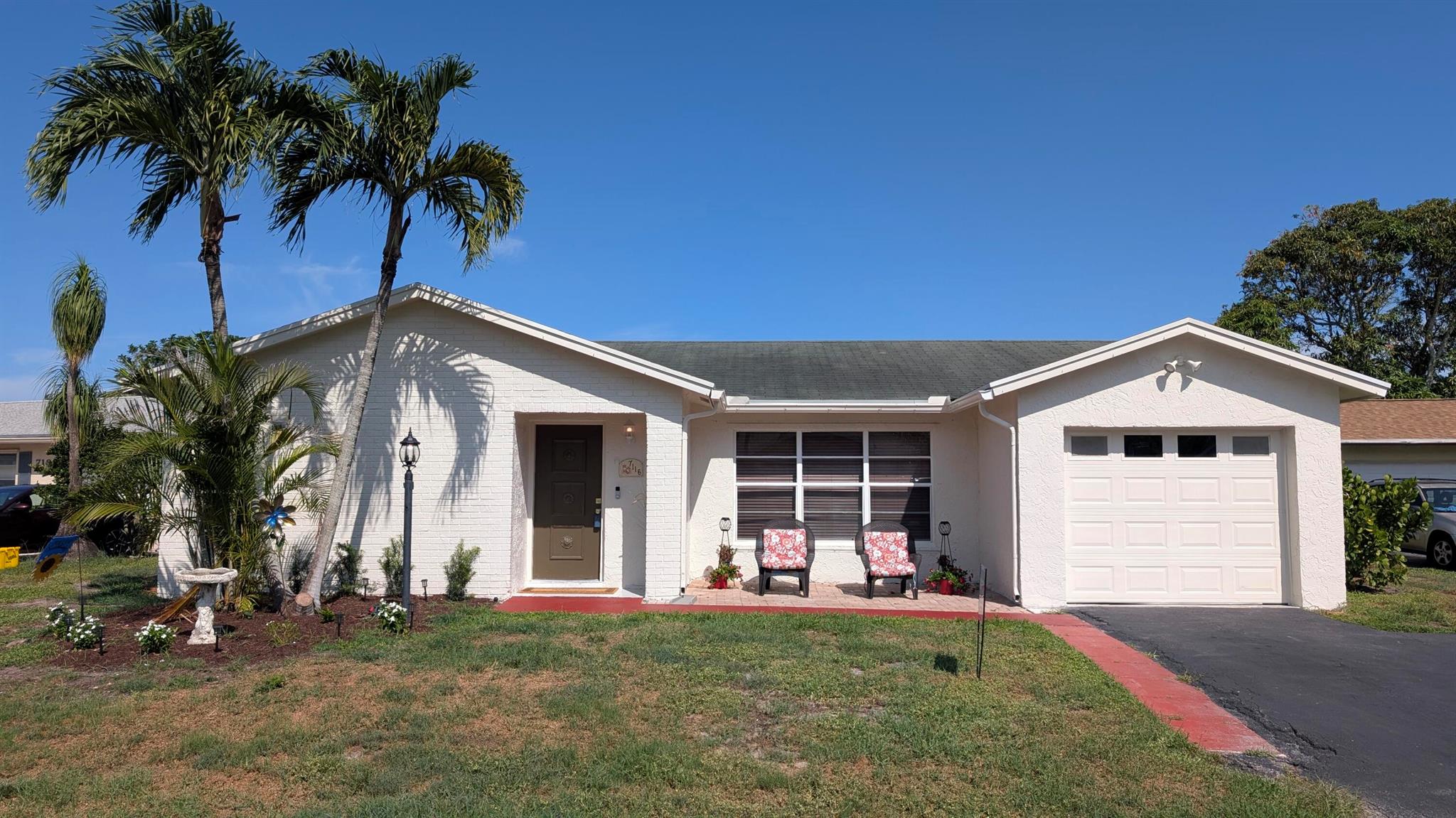The seller is having a NEW ROOF installed in a few weeks. You will love this large 2 bedroom with a den and 2 bathroom and a 1 car garage on the lake. Excellent location minutes from the newly renovated Palm Beach National golf course. Adjacent to the fountains country club.