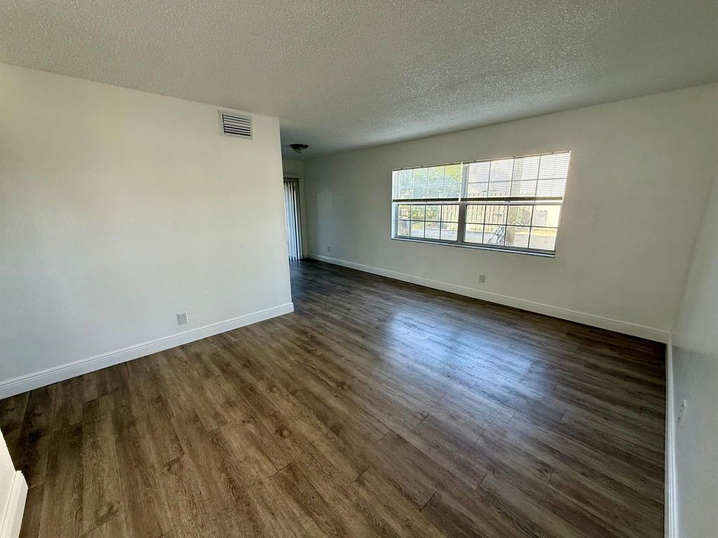 Photo of 3431 Helena Drive #1, Lake Worth, FL 33461 (MLS # R11102052)