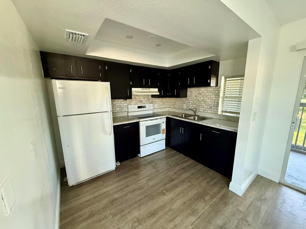 Photo of 3431 Helena Drive #1, Lake Worth, FL 33461 (MLS # R11102052)