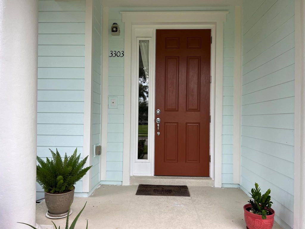 Photo of 3303 E Mallory Boulevard, Jupiter, FL 33458 (MLS # R11103838)