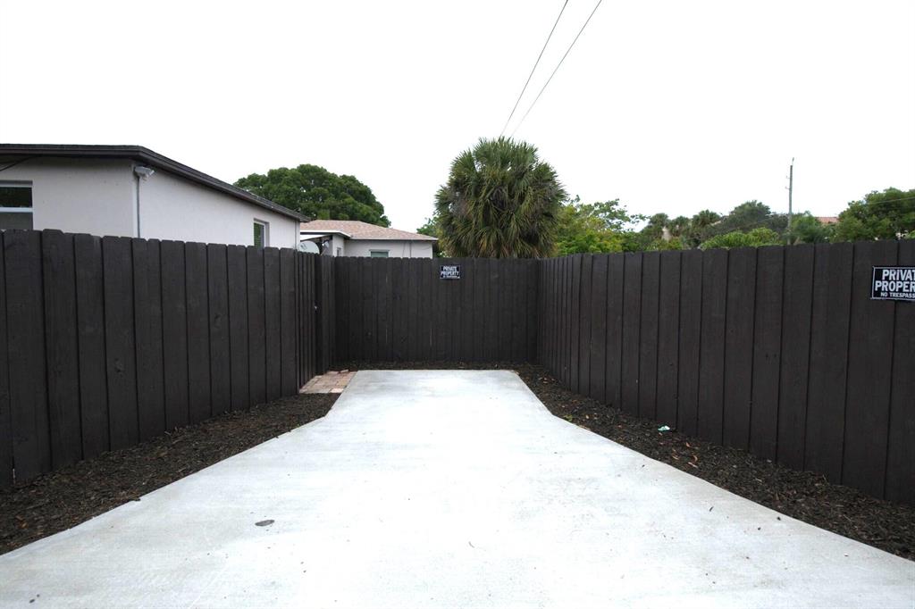 PRIVATE HOME LOCATED JUST A FEW BLOCKS FROM DOWNTOWN LAKE WORTH BEACH. BIG 1/1 WITH ASSIGNED OFF STREET PARKING, HIGH END STAINLESS STEEL APPLIANCES (GAS RANGE, NEW REF, NEW OVERHEAD MICROWAVE, NEW DISHWASHER), NEW FIXTURES, LED'S, WOOD FLOORS, LAUNDRY IN YOUR UNIT, BIG BATHROOM, NEW BLINDS, AMAZING OUTDOOR AREA FENCED IN FOR YOUR PET AND PRIVACY, TANKLESS WATER HEATER, NEW NTERIOR PAINT, ALL NEW IMPACT WINDOWS AND IMPACT DOORS THROUGHOUT. COME MAKE THIS YOUR HOME.