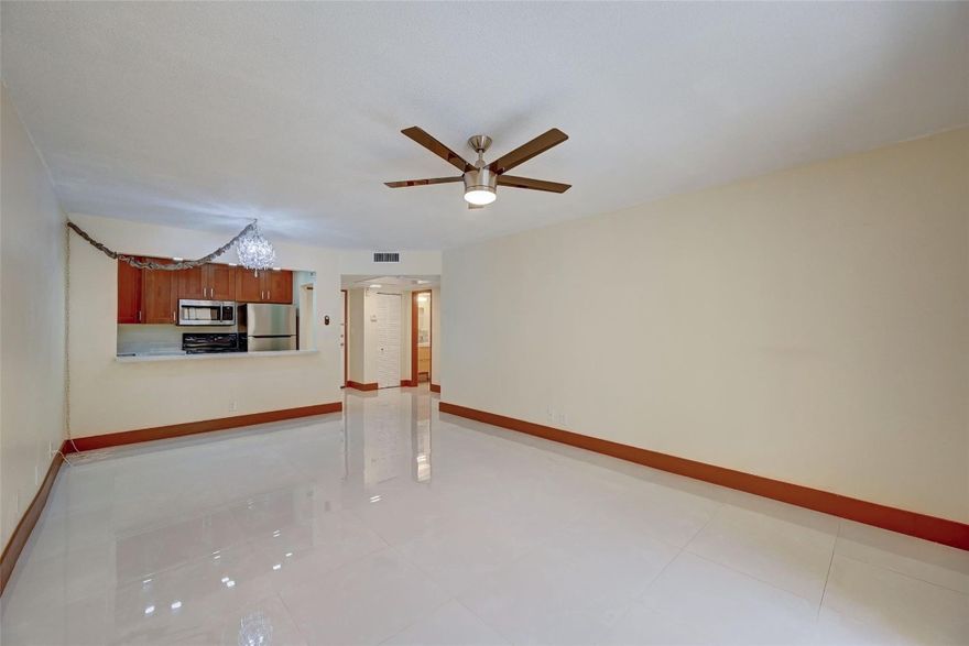 Modern 1-Bed, 1-Bath Gem!!This bright, remodeled 1-bed, 1-bath, first floor condo boasts a modern design, tankless hot water heater, and free community laundry. Have your morning coffee on your covered, screened in patio just off your large living room. Enjoy a dip in the community pool, or use the common BBQ's and clubhouse. You get your own assigned parking spot, and there are plenty of spaces for guests!  Perfect for first time buyers, those that are downsizing, or the most budget conscious! Just a few blocks to the shopping of N Federal Highway, or the relaxing Pompano beaches. $440/monthly maintenance